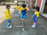103 playing with the rubber band rope (108)