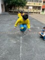 103 playing with the rubber band rope (115)