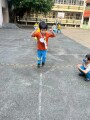103 playing with the rubber band rope (118)